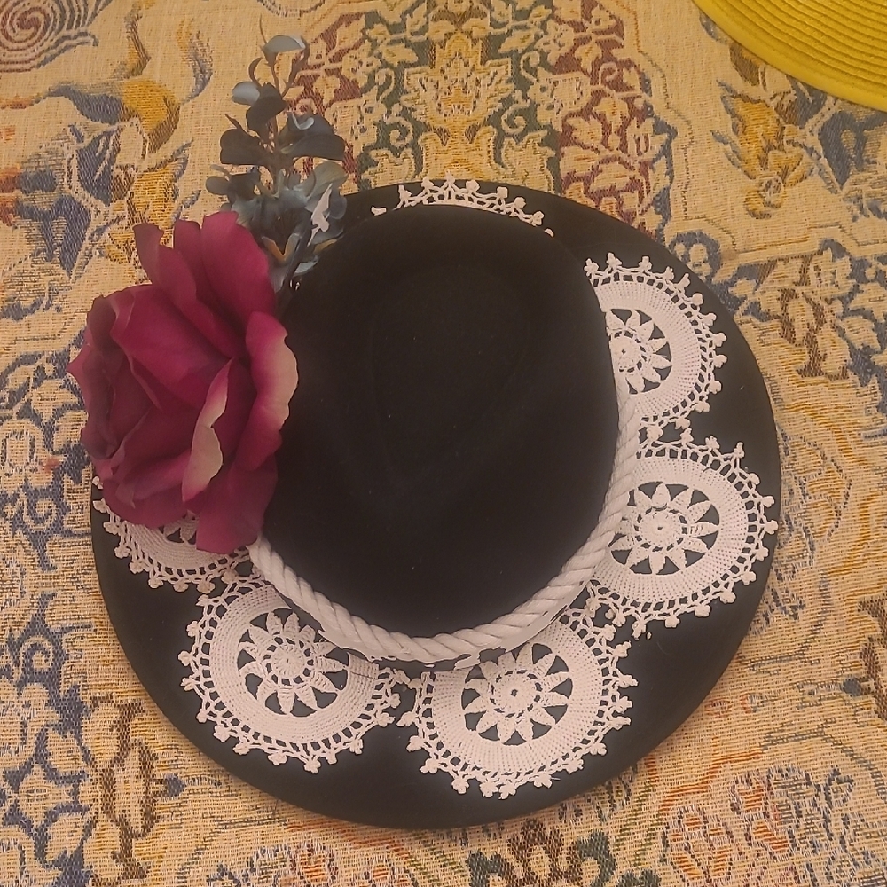 Elegant Black Hat with Floral Accent